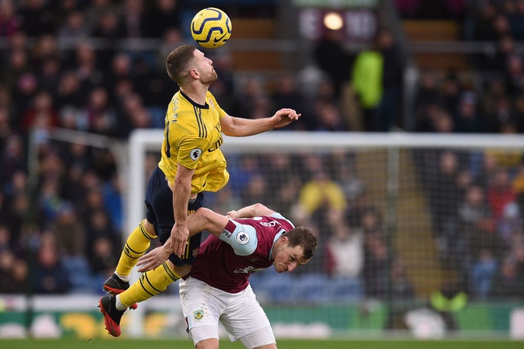 Arsenal Player Ratings vs Burnley 4 Arsenal's German defender Shkodran Mustafi wins a header from Burnley's New Zealand striker Chris Wood during the English Premier League football match between Burnley and Arsenal at Turf Moor in Burnley, north west England on February 2, 2020. (Photo by Oli SCARFF / AFP)