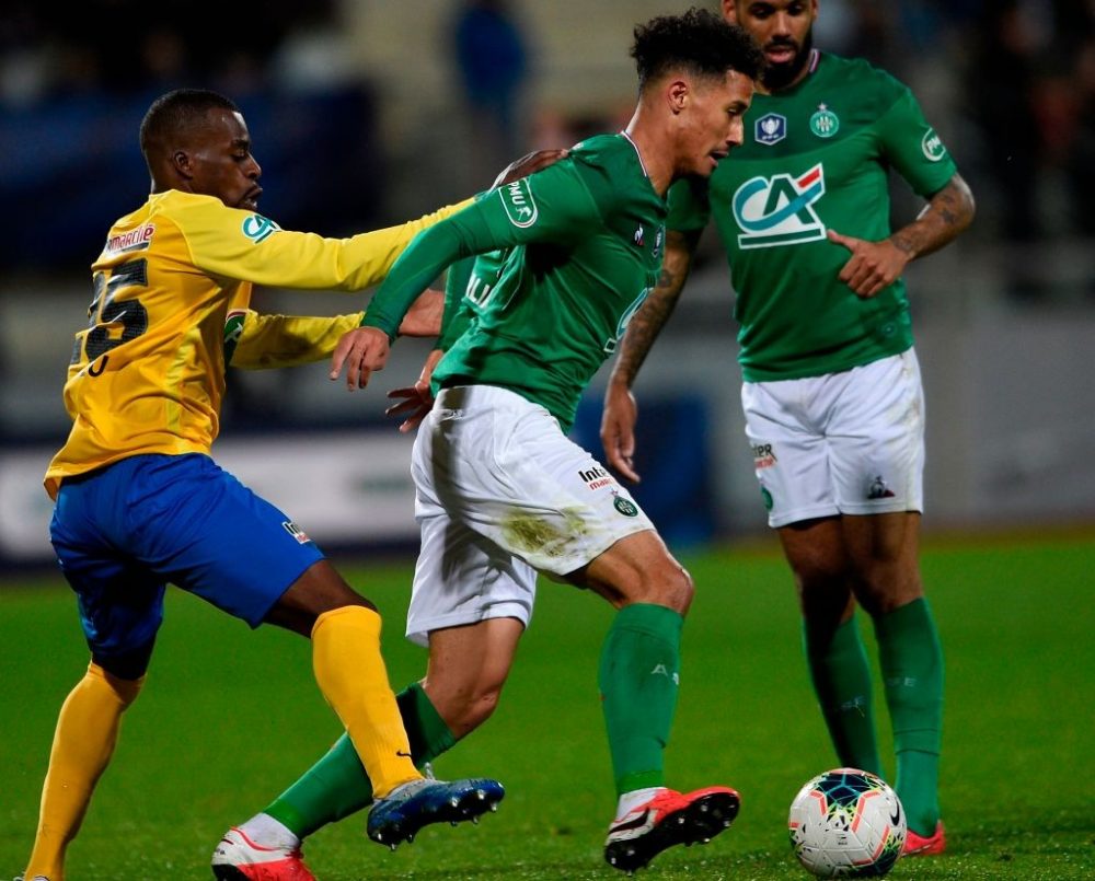 Epinal's French defender David Luvualu (L) vies with Saint-Etienne's French defender William Saliba during the French Cup quarter-final football match between SAS Epinal and AS Saint-Etienne at Marcel Picot stadium in Tomblaine, northeastern France on February 13, 2020. (Photo by JEAN-CHRISTOPHE VERHAEGEN / AFP)