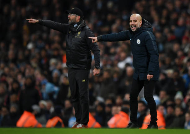FA drop Manchester City hacking complaint about Liverpool 2 Josep Guardiola, Manager of Manchester City and Jurgen Klopp, Manager of Liverpool give their team instructions during the Premier League match between Manchester City and Liverpool FC at the Etihad Stadium on January 3, 2019 in Manchester, United Kingdom.