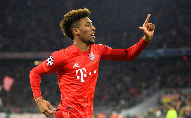Kingsley Coman of FC Bayern Munich celebrates after scoring his team's first goal during the UEFA Champions League group B match between Bayern Muenchen and Tottenham Hotspur at Allianz Arena on December 11, 2019 in Munich, Germany. 
