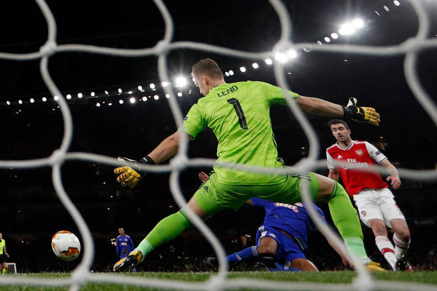 Olympiakos' French-born Moroccan striker Youssef El-Arabi (C) scores their late goal during extra time in the UEFA Europa league round of 32 second leg football match between Arsenal and Olympiakos at the Emirates stadium in London on February 27, 2020. - The game finished 1-2 after extra time, Olympiakos winning the tie on away goals.