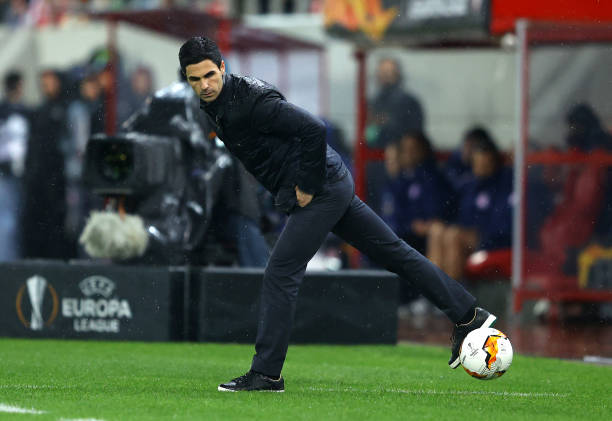 Mikel Arteta, Manager of Arsenal controls the ball during the UEFA Europa League round of 32 first leg match between Olympiacos FC and Arsenal FC at Karaiskakis Stadium on February 20, 2020 in Piraeus, Greece.