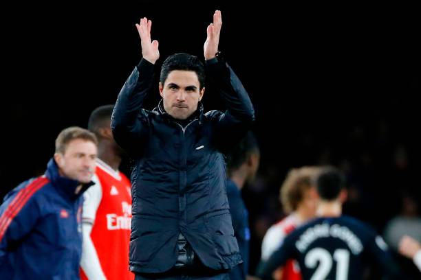Arsenal's Spanish head coach Mikel Arteta applauds at the end of the English Premier League football match between Arsenal and Everton at the Emira...