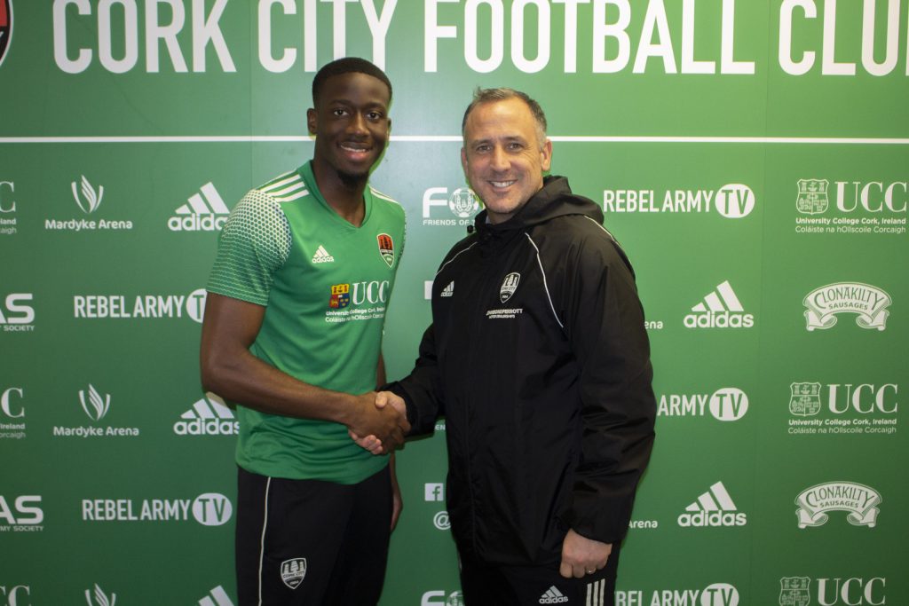 Joseph Olowu signing for Cork City (Photo via CorkCityFC.ie)