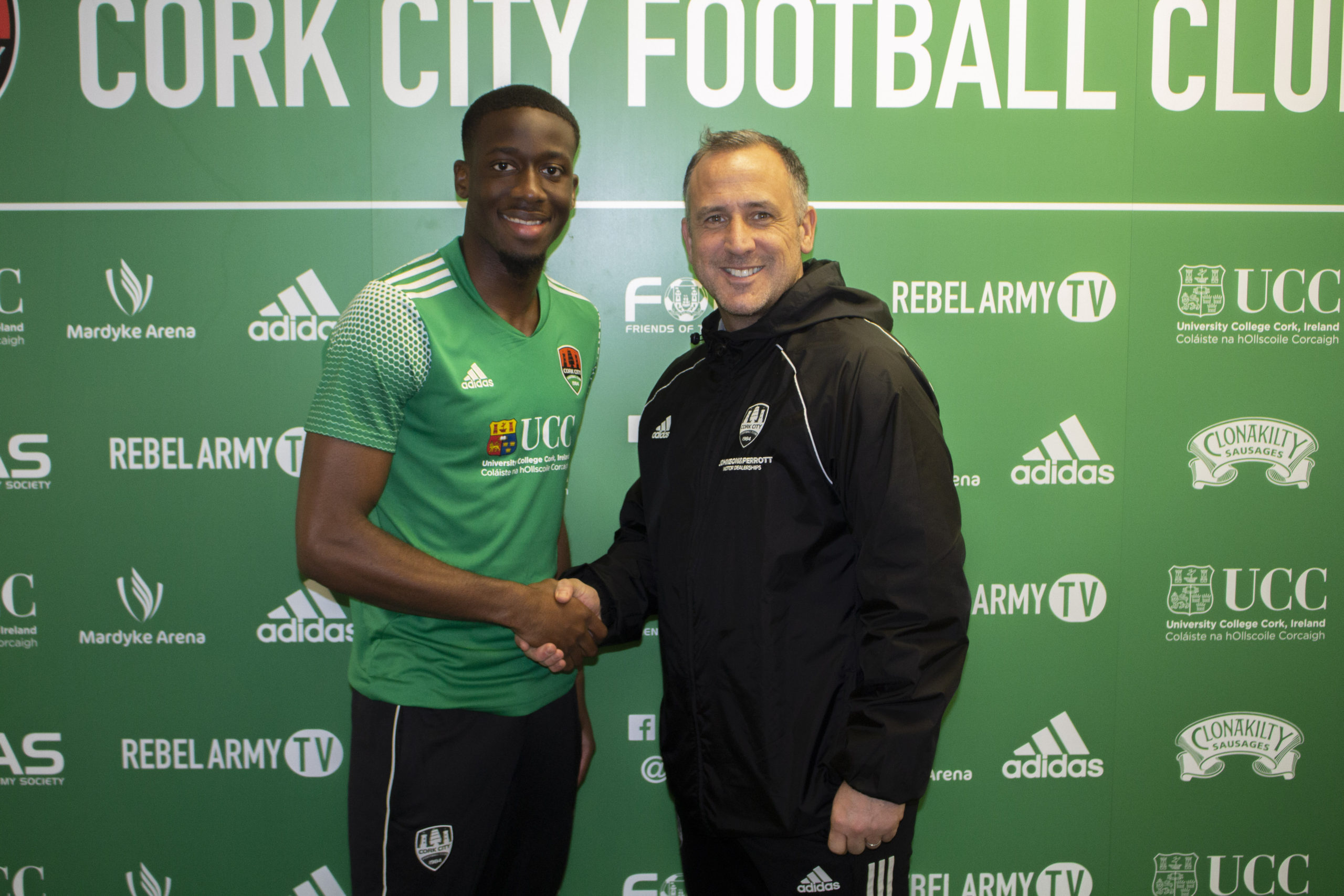 Joseph Olowu signing for Cork City (Photo via CorkCityFC.ie)