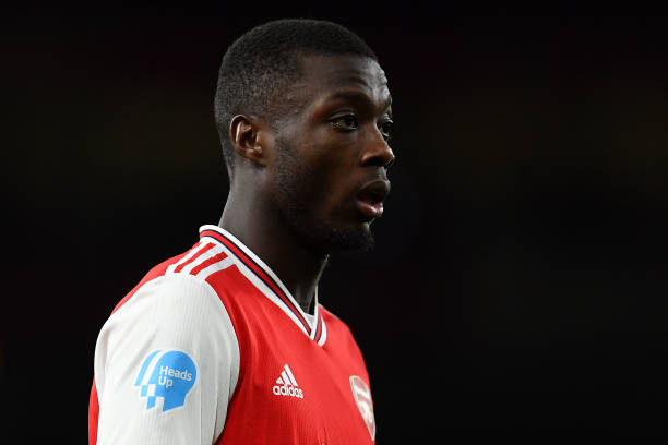 Nicolas Pepe of Arsenal with the Heads Up logo on his shirt during the Premier League match between Arsenal FC and Newcastle United at Emirates Sta...