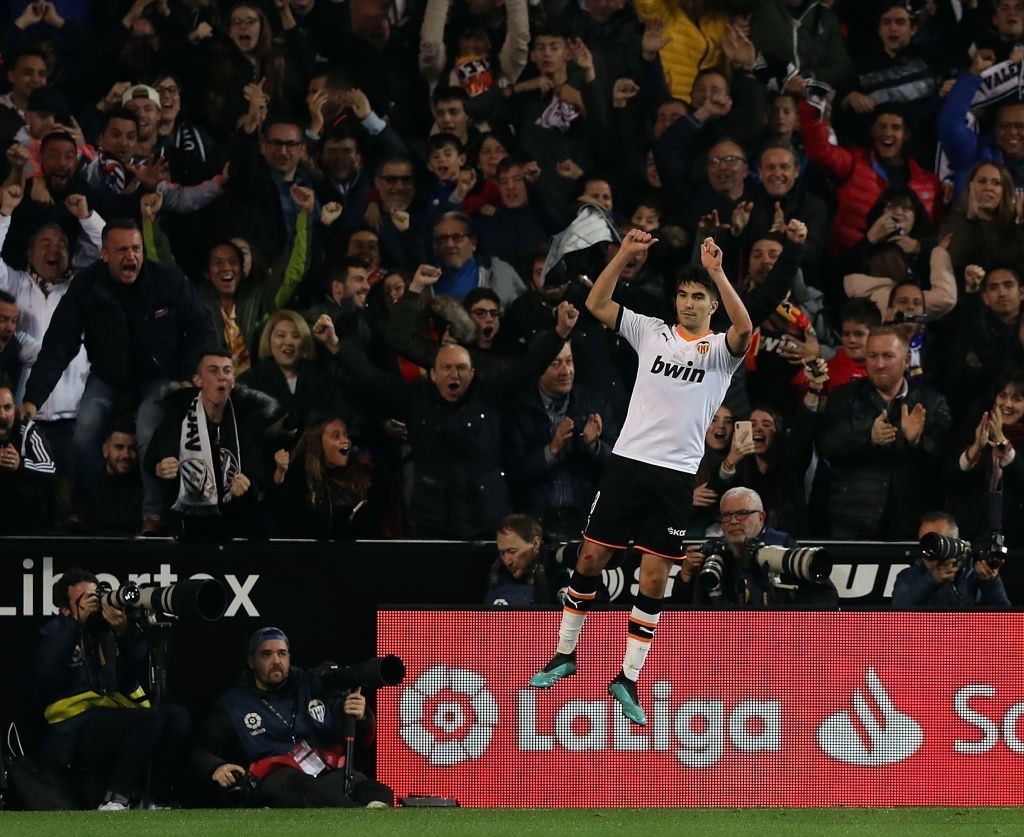 VALENCIA, SPAIN - DECEMBER 15: Carlos Soler of Valencia celebrates after scoring his team's first goal during the Liga match between Valencia CF an...