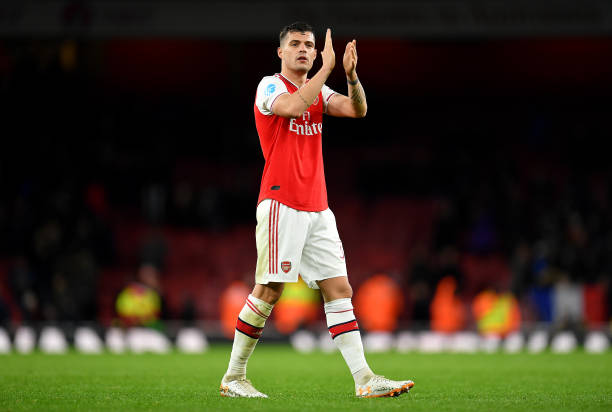 Granit Xhaka of Arsenal celebrates victory during the Premier League match between Arsenal FC and Newcastle United at Emirates Stadium on February 16, 2020 in London, United Kingdom.