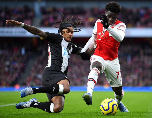 Arsenal Player Ratings vs Newcastle United 4 Bukayo Saka of Arsenal and Valentino Lazaro of Newcastle United battle for possession during the Premier League match between Arsenal FC and Newcastle United at Emirates Stadium on February 16, 2020 in London, United Kingdom.