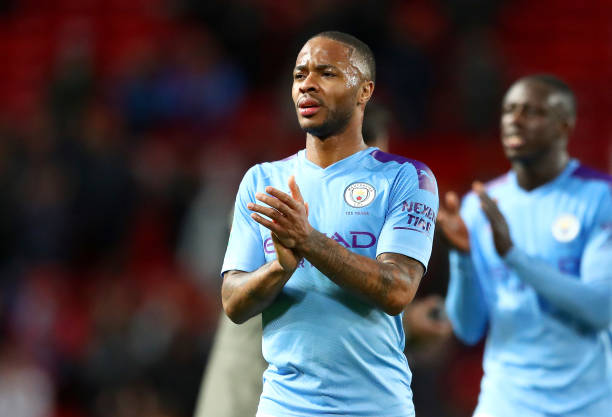 MANCHESTER, ENGLAND - JANUARY 07: Raheem Sterling of Manchester City acknowledges the fans after the Carabao Cup Semi Final match between Mancheste...