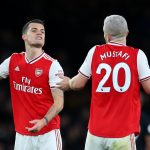 LONDON, ENGLAND - FEBRUARY 23: Granit Xhaka and Shkodran Mustafi of Arsenal in conversation at full-time during the Premier League match between Arsenal FC and Everton FC at Emirates Stadium on February 23, 2020 in London, United Kingdom. (Photo by Catherine Ivill/Getty Images)