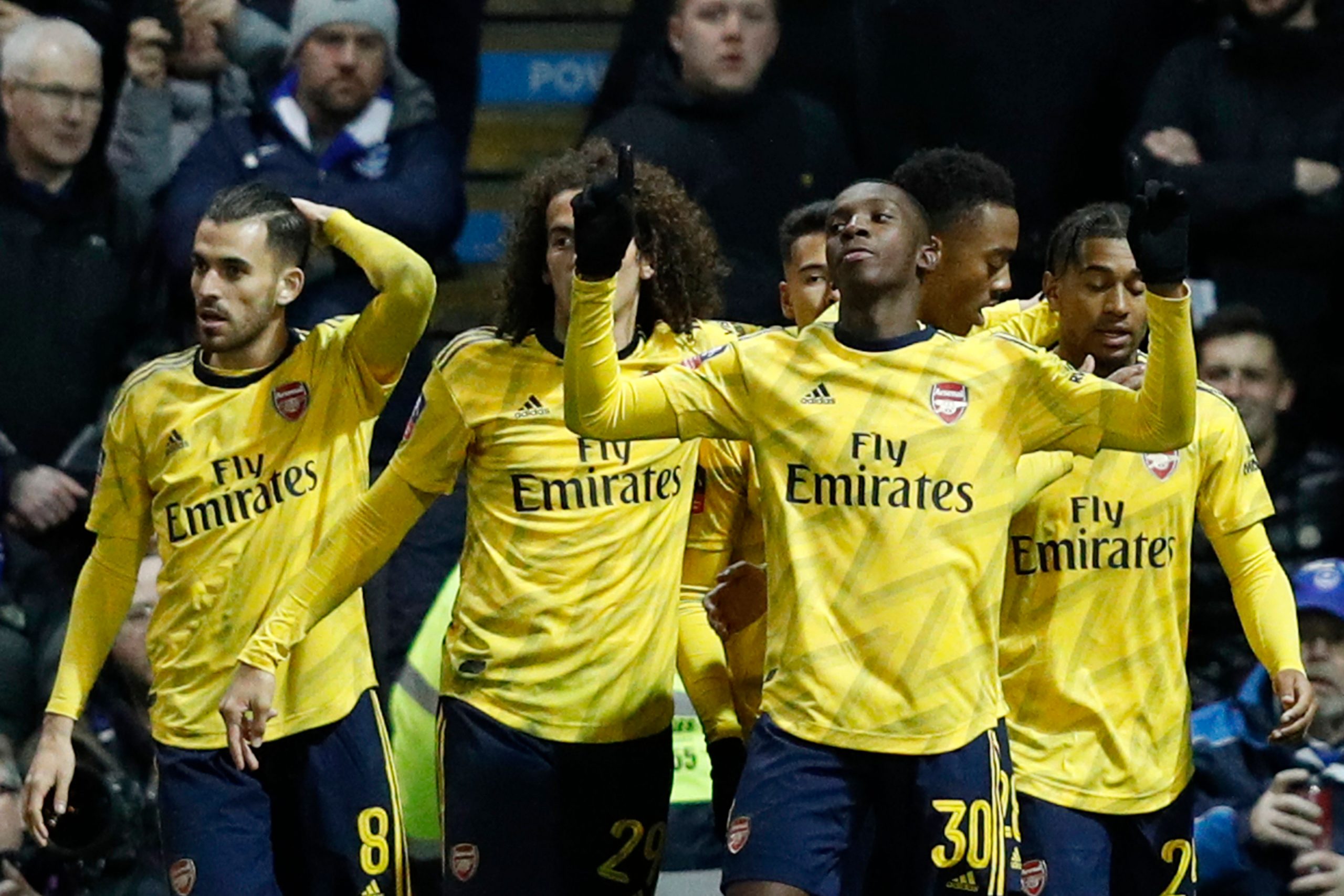 Arsenal's English striker Eddie Nketiah (2R) celebrates scoring their second goal during the English FA Cup fifth round football match between Portsmouth and Arsenal at Fratton Park stadium in Portsmouth, southern England, on March 2, 2020.