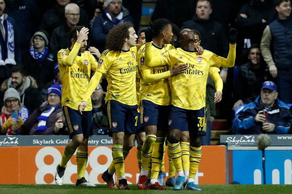 Arsenal's English striker Eddie Nketiah (R) celebrates scoring their second goal during the English FA Cup fifth round football match between Portsmouth and Arsenal at Fratton Park stadium in Portsmouth, southern England, on March 2, 2020.