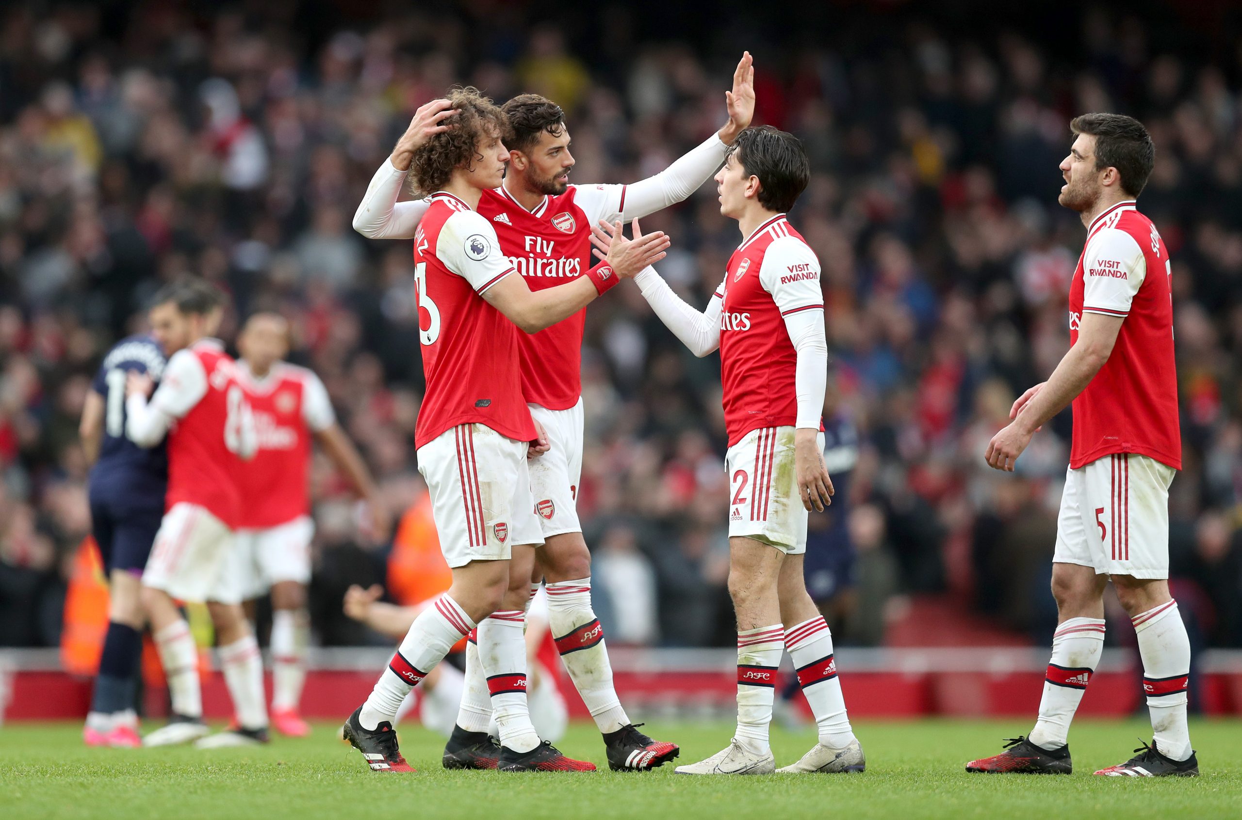 Players of Arsenal celebrate following the Premier League match between Arsenal FC and West Ham United at Emirates Stadium on March 07, 2020 in Lon...