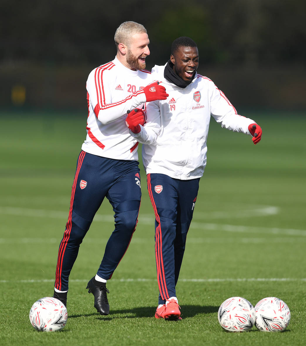 ST ALBANS, ENGLAND - MARCH 01: Shkodran Mustafi and Nicolas Pepe of Arsenal during a training session at London Colney on March 01, 2020 in St Alba...