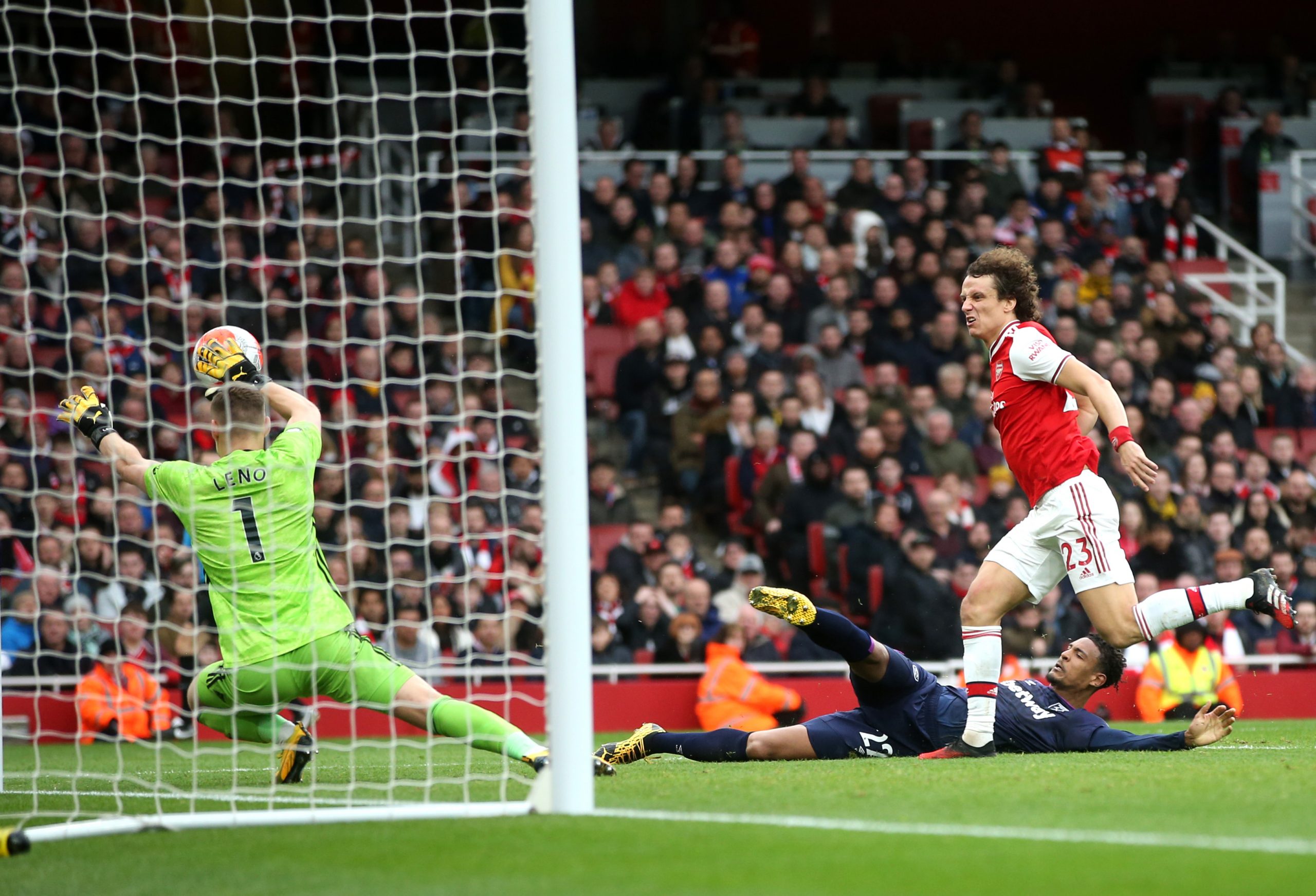 Bernd Leno of Arsenal saves a shot from Sebastien Haller of West Ham United during the Premier League match between Arsenal FC and West Ham United ...