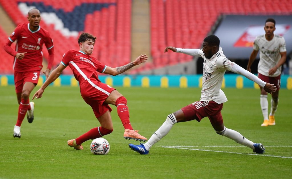 Smith Rowe to start: Arsenal Predicted Lineup vs Rapid Vienna 4 LONDON, ENGLAND - AUGUST 29: Neco Williams of Liverpool and Ainsley Maitland-Niles of Arsenal battle for the ball during the FA Community Shield final between Arsenal and Liverpool at Wembley Stadium on August 29, 2020 in London, England. (Photo by Justin Tallis/ pool via Getty Images)
