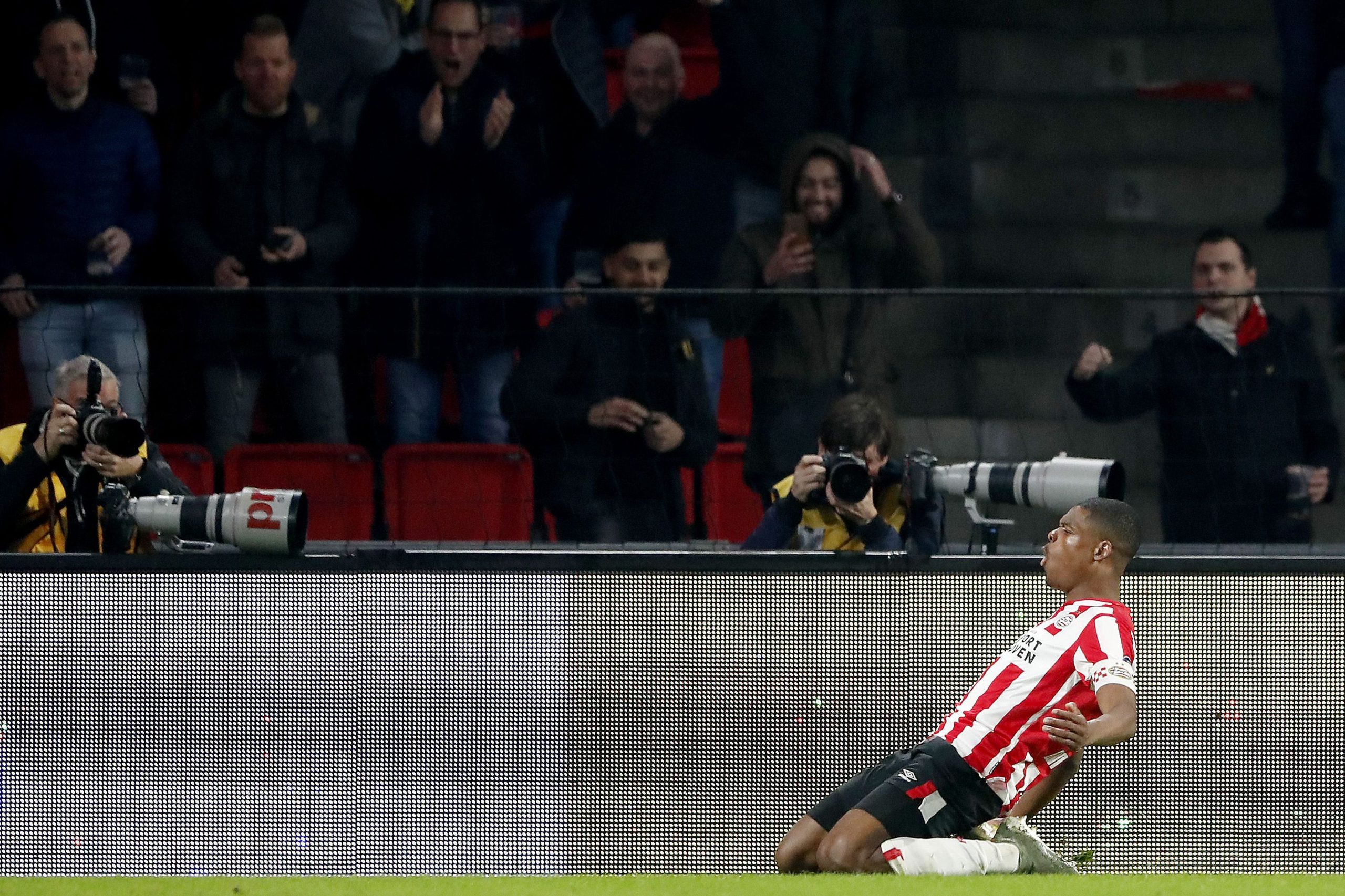 PSV's Denzel Dumfries celebrates after scoring a goal during the Dutch Eredivisie match PSV vs Willem II in Eindhoven, The Netherlands, on February...