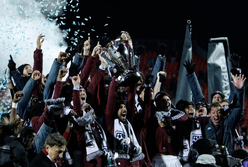 MLS push restart date back again 2 TORONTO, ON - NOVEMBER 21: Captain Pablo Mastroeni #25 of the Colorado Rapids holds the Philip F. Anschutz Trophy and celebrates with teammates after their 2-1 overtime victory against FC Dallas during the 2010 MLS Cup match at BMO Field on November 21, 2010 in Toronto, Canada. (Photo by Abelimages/Getty Images)