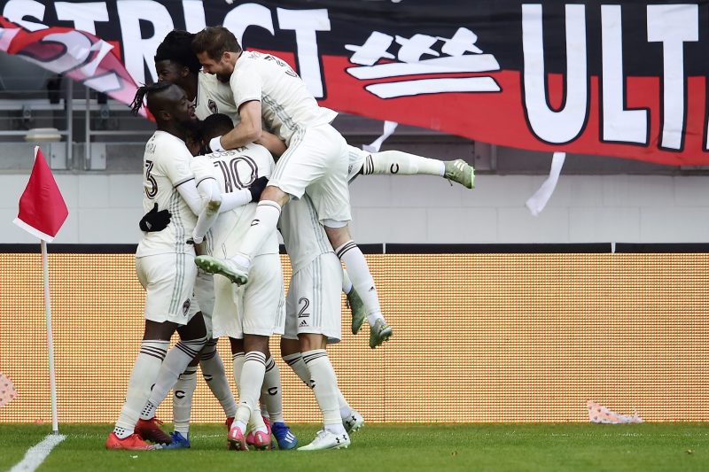 WASHINGTON, DC - FEBRUARY 29: Jonathan Lewis #7 of Colorado Rapids celebrates with his teammates after scoring the game winning goal against the D....