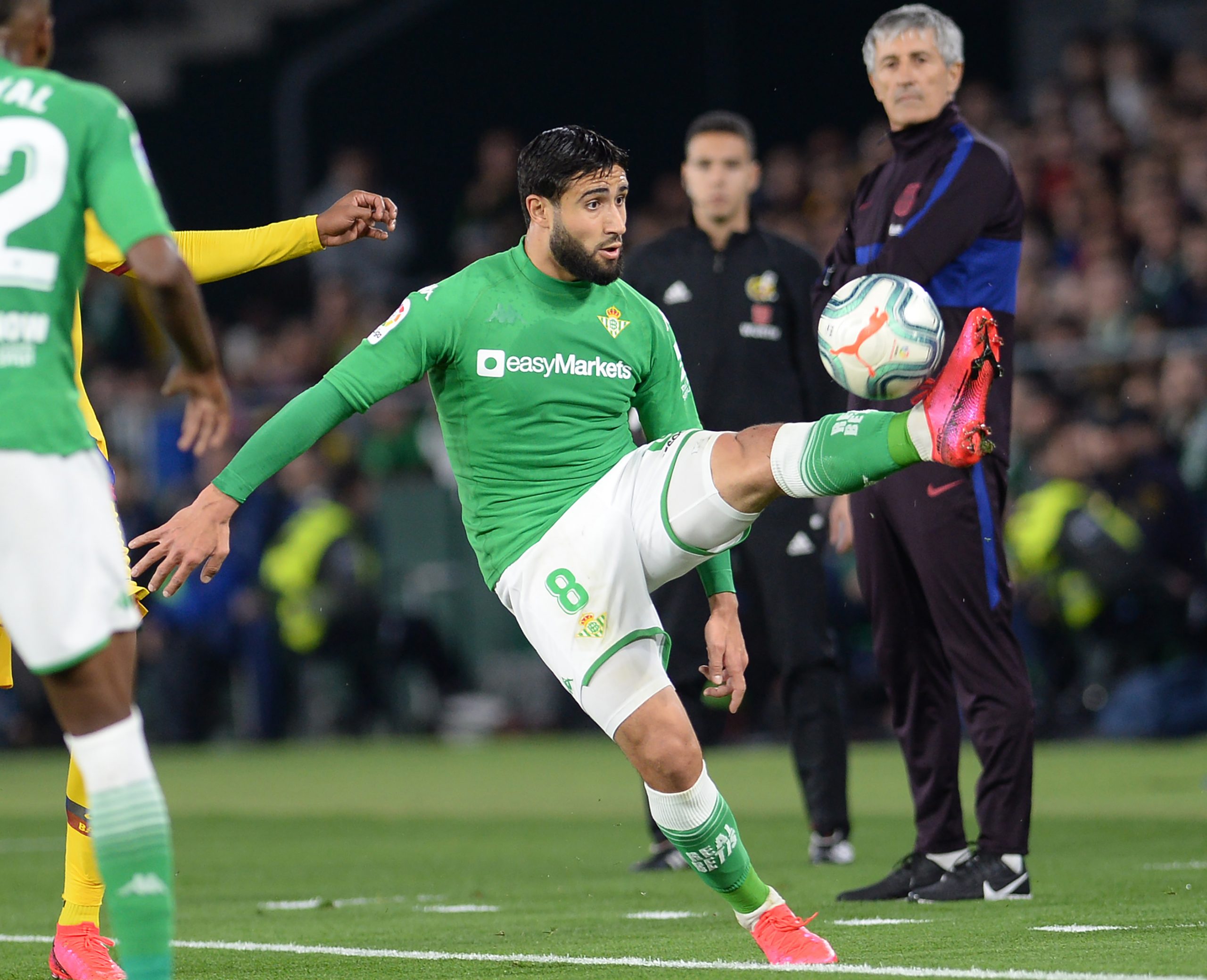 Real Betis' French midfielder Nabil Fekir controls the ball during the Spanish league football match between Real Betis and FC Barcelona at the Ben...