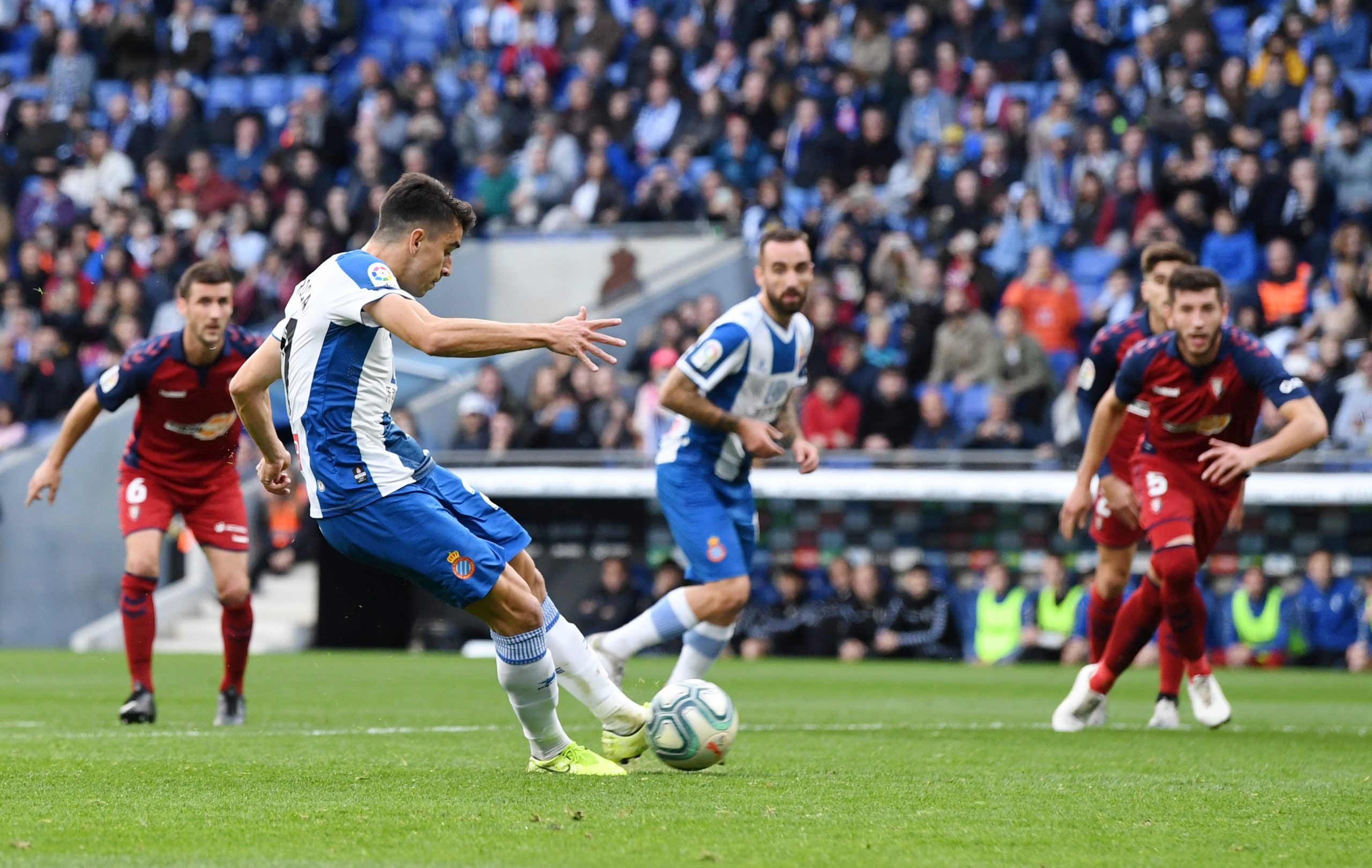 BARCELONA, SPAIN - DECEMBER 01: Marc Roca of Espanyol scores from the penalty spot during the La Liga match between RCD Espanyol and CA Osasuna at ...