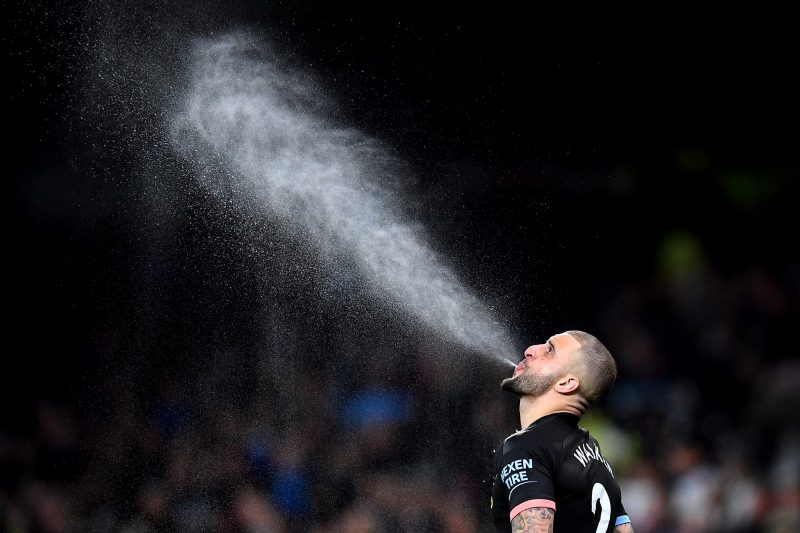 LONDON, ENGLAND - FEBRUARY 02: Kyle Walker of Manchester City spits water during the Premier League match between Tottenham Hotspur and Manchester ...