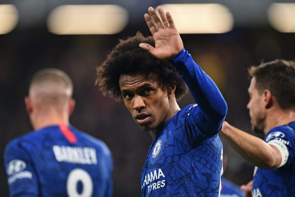 Chelsea's Brazilian midfielder Willian celebrates scoring the opening goal during the English FA Cup fifth round football match between Chelsea and...