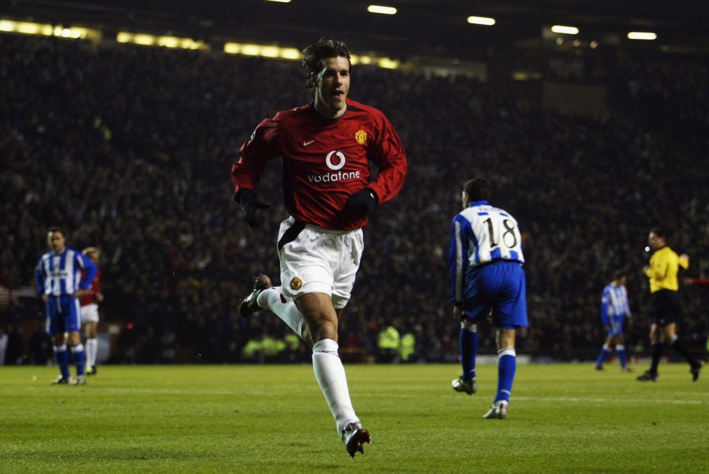 MANCHESTER - DECEMBER 11:  Ruud Van Nistelrooy of Manchester United celebrates after scoring his first goal during the Manchester United v Deportivo La Coruna UEFA Champions League, Phase 2, Group D match at Old Trafford on December 11, 2002 in Manchester, England.  Manchester United won the match 2-0. (Photo by Gary M. Prior/Getty Images)
