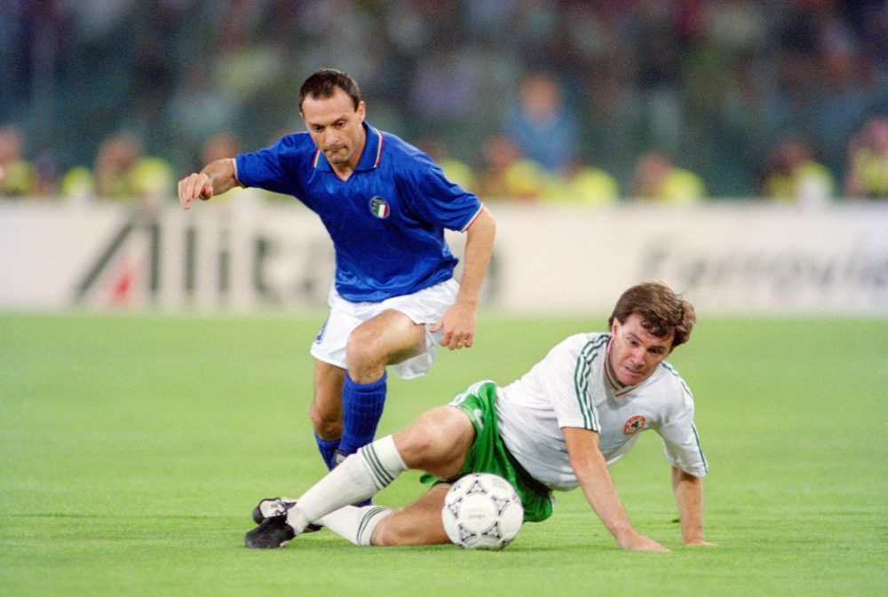 ROME, ITALY - JUNE 30: Republic of Ireland player Ray Houghton is challenged by Salvatore Schillaci during the 1990 FIFA World Cup quarter Final defeat against Italy at the Olympic Stadium on June 30, 1990 in Rome, Italy. (Photo by Allsport/Getty Images)