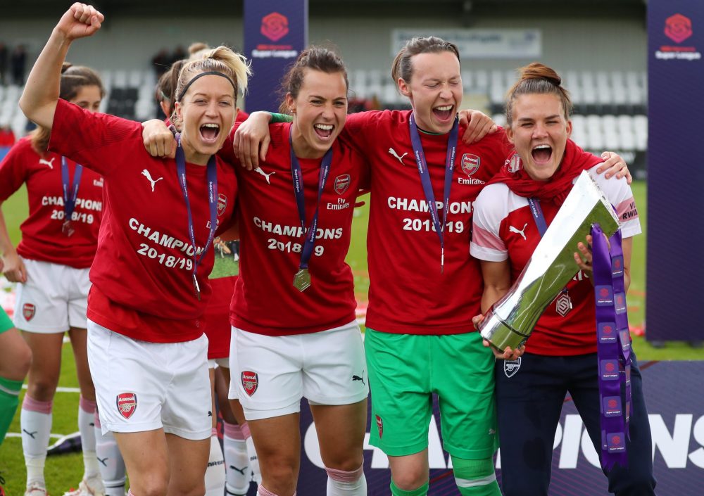 BOREHAMWOOD, ENGLAND - MAY 11: Janni Arnth, Viki Schnaderbeck, Pauline Peyraud-Magnin and Katrine Veje celebrate with the trophy after the WSL match between Arsenal Women and Manchester City at Meadow Park on May 11, 2019 in Borehamwood, England. (Photo by Catherine Ivill/Getty Images)