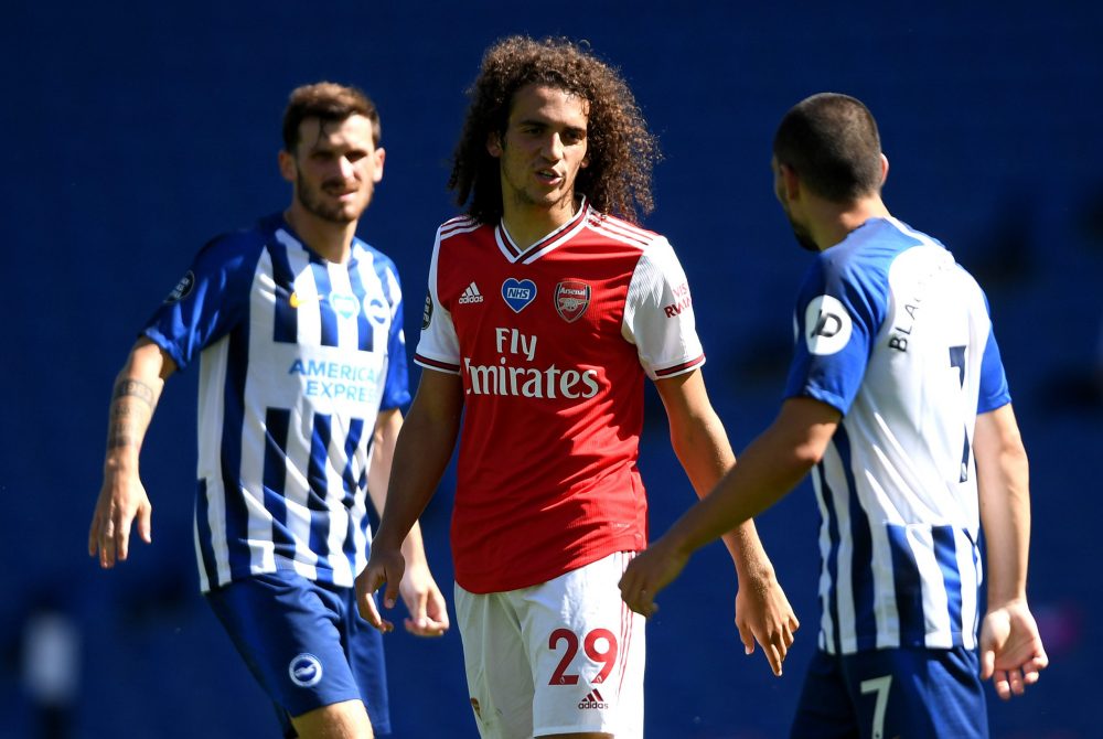BRIGHTON, ENGLAND - JUNE 20: Matteo Guendouzi of Arsenal confronts Neal Maupay of Brighton and Hove Albion during the Premier League match between ...