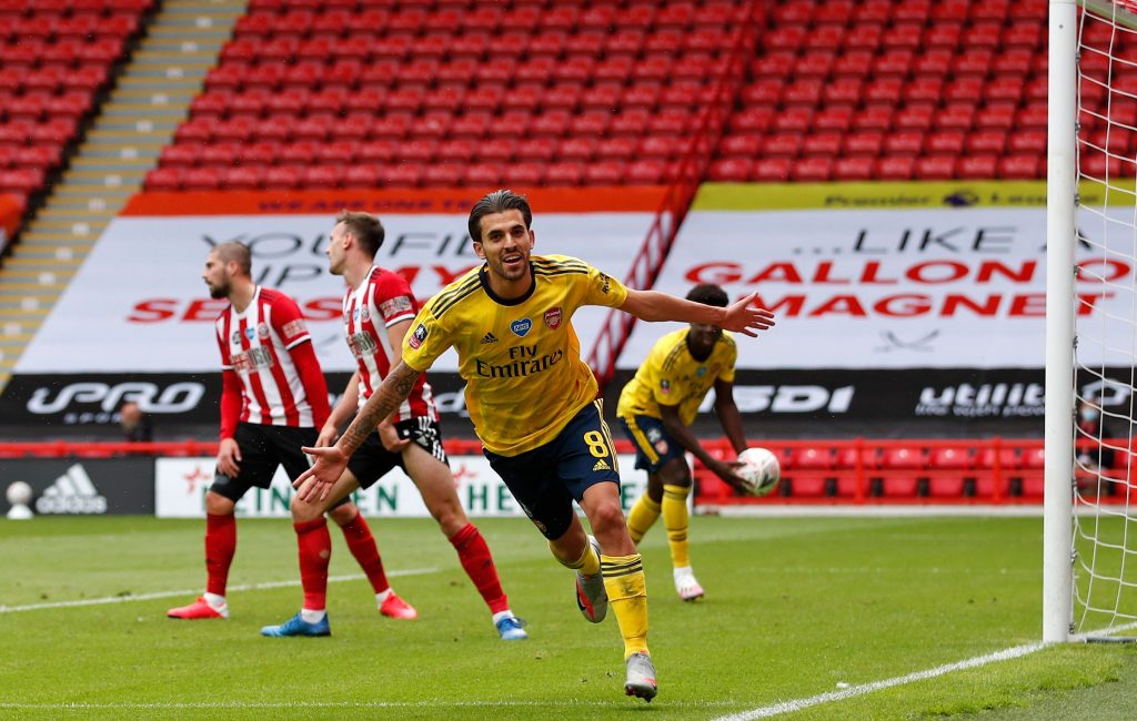 Arsenal's Spanish midfielder Dani Ceballos (C) runs to celebrate scoring a goal during the English FA Cup quarter-final football match between Sheffield United and Arsenal at Bramall Lane in Sheffield, northern England on June 28, 2020. (Photo by ANDREW BOYERS / POOL / AFP) / RESTRICTED TO EDITORIAL USE. No use with unauthorized audio, video, data, fixture lists, club/league logos or 'live' services. Online in-match use limited to 120 images. An additional 40 images may be used in extra time. No video emulation. Social media in-match use limited to 120 images. An additional 40 images may be used in extra time. No use in betting publications, games or single club/league/player publications. / (Photo by ANDREW BOYERS/POOL/AFP via Getty Images)