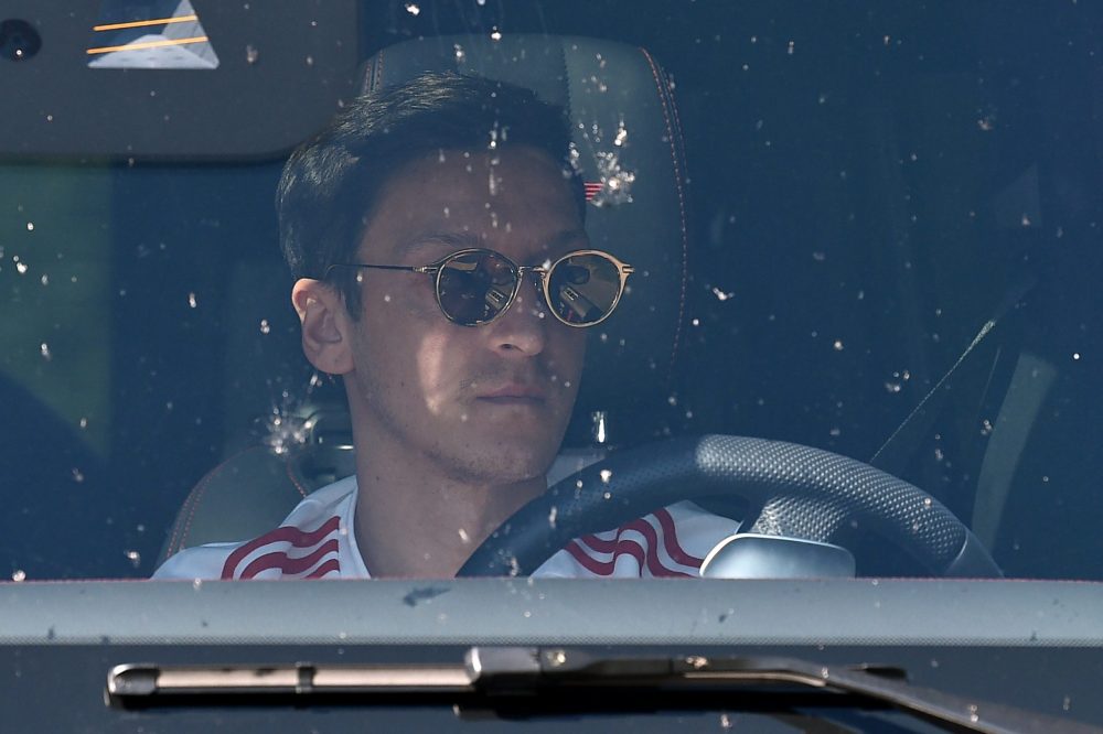 Arsenal's German midfielder Mesut Ozil arrives at Arsenal's Colney training centre north of London on May 20, 2020 as training continues for Premie...