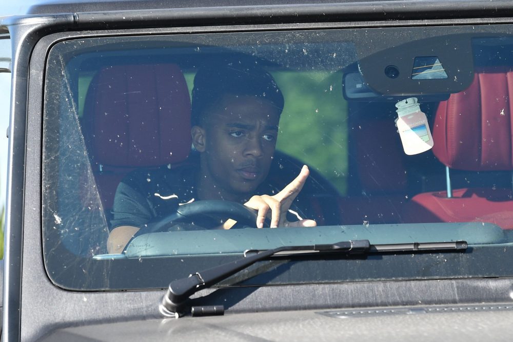 Arsenal's English midfielder Joe Willock arrives at Arsenal's Colney training centre north of London on May 20, 2020 as training continues for Premier League clubs with a June re-start the intention during the COVID-19 pandemic. - Teams have started socially-distanced training in small groups this week, but several Premier League stars have expressed concerns about plans to resume the season. (Photo by Glyn KIRK / AFP)