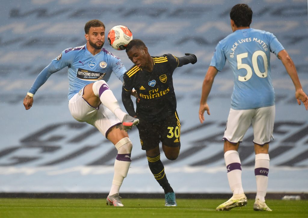 Same old story: Arsenal Player Ratings vs Manchester City 5 Arsenal's English striker Eddie Nketiah (C) vies for the ball against Manchester City's English defender Kyle Walker (L) during the English Premier League football match between Manchester City and Arsenal at the Etihad Stadium in Manchester, north west England, on June 17, 2020. - The Premier League makes its eagerly anticipated return today after 100 days in lockdown but behind closed doors due to coronavirus restrictions. (Photo by PETER POWELL / POOL / AFP) / RESTRICTED TO EDITORIAL USE. No use with unauthorized audio, video, data, fixture lists, club/league logos or 'live' services. Online in-match use limited to 120 images. An additional 40 images may be used in extra time. No video emulation. Social media in-match use limited to 120 images. An additional 40 images may be used in extra time. No use in betting publications, games or single club/league/player publications. / (Photo by PETER POWELL/POOL/AFP via Getty Images)