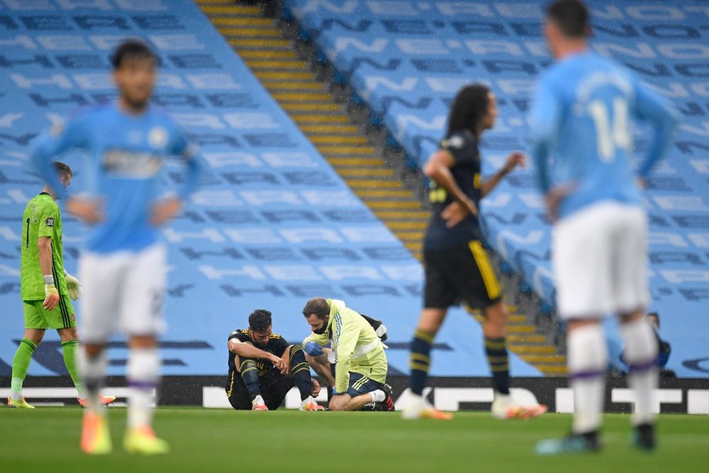 Gabriel Martinelli out until end of 2020 3 Arsenal's Spanish defender Pablo Mari (C) sits on the pitch after picking up an injury during the English Premier League football match between Manchester City and Arsenal at the Etihad Stadium in Manchester, north west England, on June 17, 2020. - The Premier League makes its eagerly anticipated return today after 100 days in lockdown but behind closed doors due to coronavirus restrictions. (Photo by PETER POWELL / POOL / AFP)
