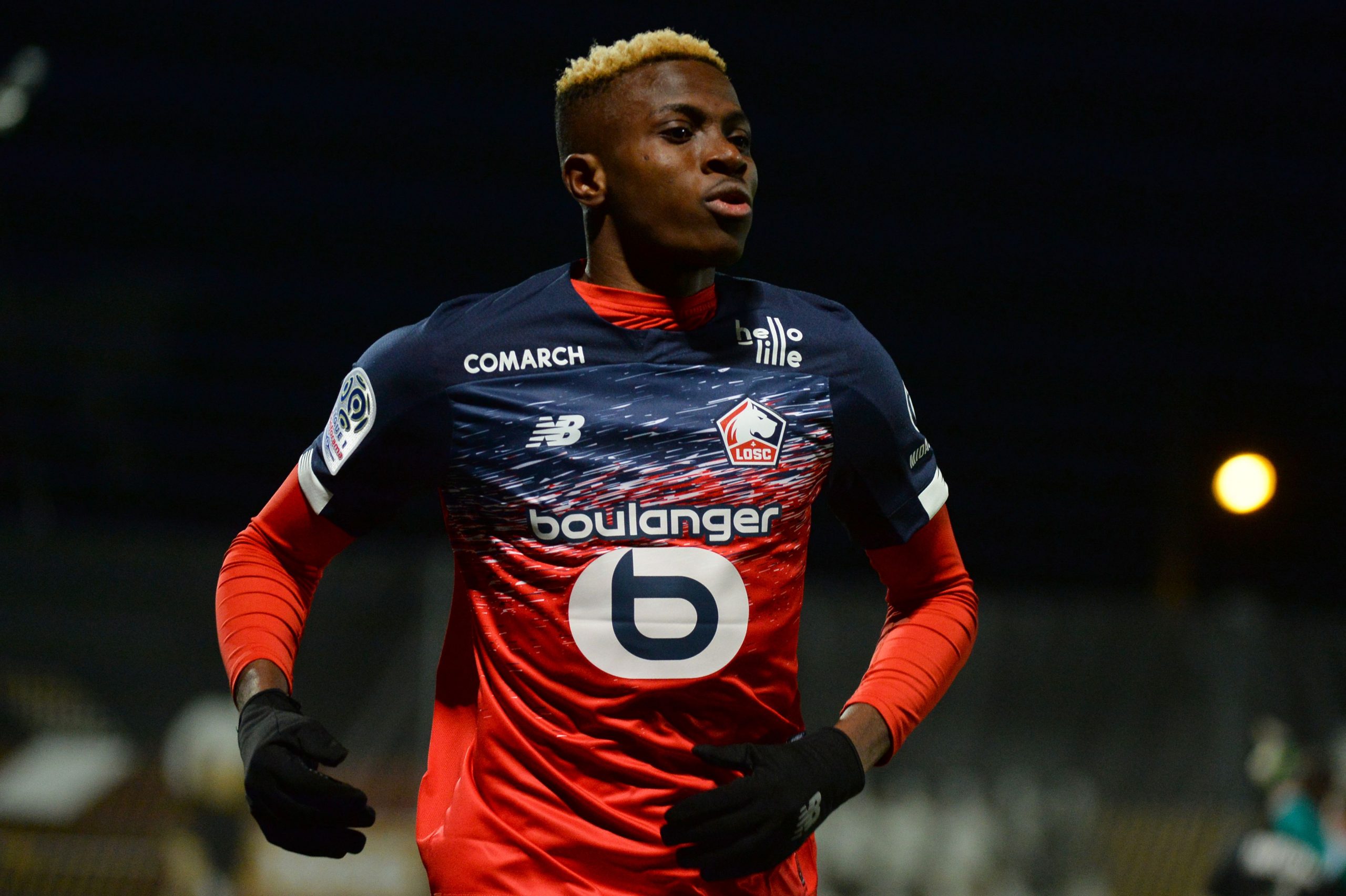 Lille's Nigerian forward Victor Osimhen celebrates scoring his team's first goal during the French L1 Football match between Angers SCO and Lille (...