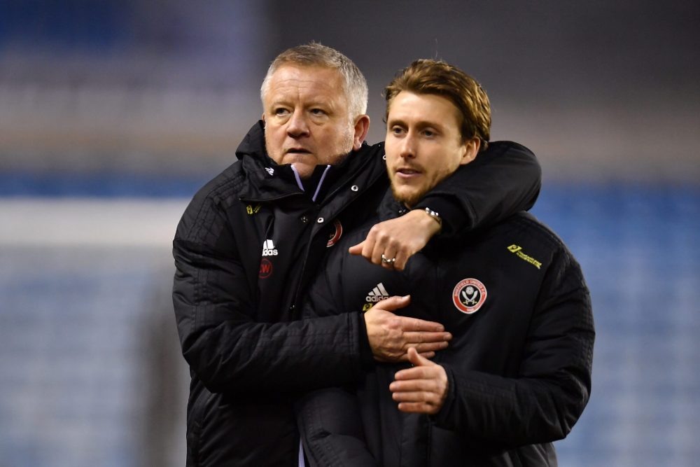 2nd ex-Arsenal man's contract cancelled by Premier League side 3 LONDON, ENGLAND - JANUARY 25: Chris Wilder, Manager of Sheffield United embraces Luke Freeman of Sheffield United after their sides victory in the FA Cup Fourth Round match between Millwall FC and Sheffield United at The Den on January 25, 2020 in London, England. (Photo by Justin Setterfield/Getty Images)