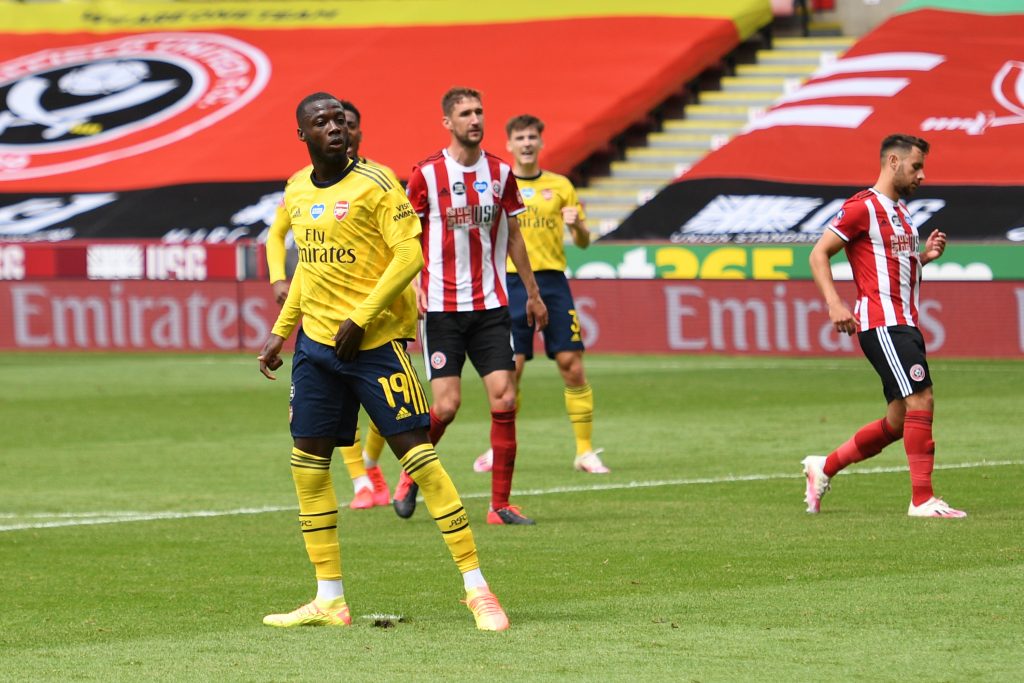 SHEFFIELD, ENGLAND - JUNE 28: Nicolas Pepe of Arsenal celebrates after scoring his teams first goal from the penalty spot during the FA Cup Fifth Quarter Final match between Sheffield United and Arsenal FC at Bramall Lane on June 28, 2020 in Sheffield, England. (Photo by Oli Scarff/Pool via Getty Images)