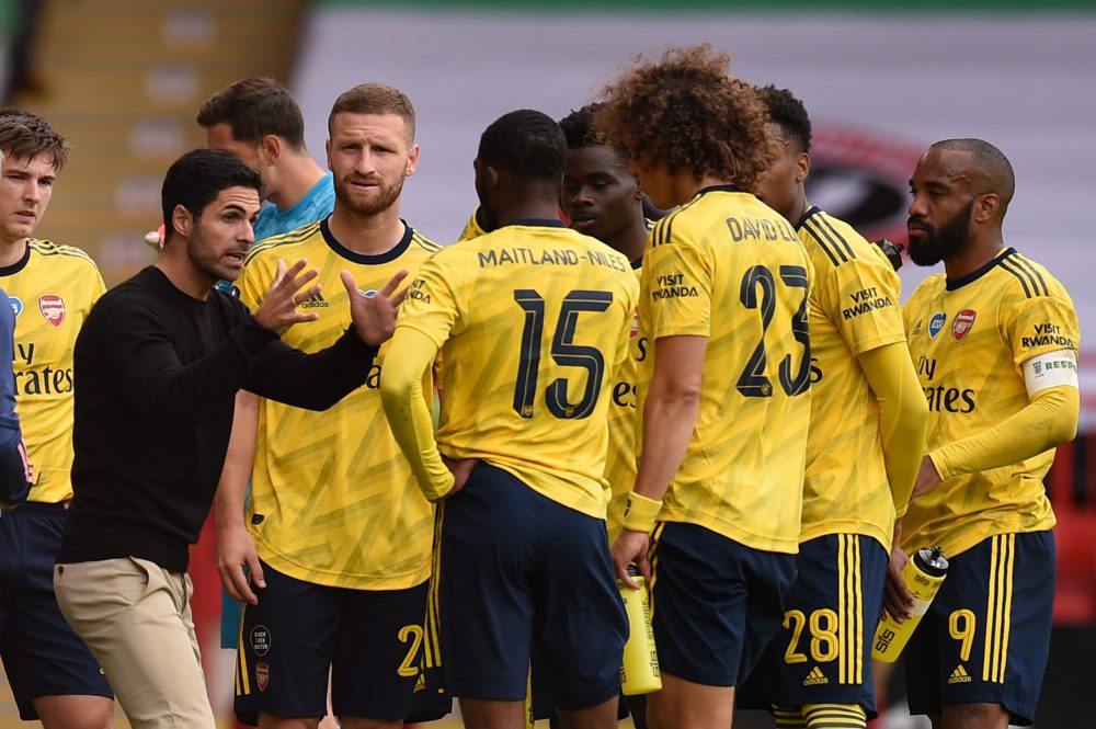 SHEFFIELD, ENGLAND - JUNE 28: Mikel Arteta, Manager of Arsenal speaks to his team during a drinks break during the FA Cup Fifth Quarter Final match...
