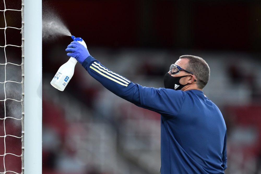 Arsenal want answers over Kieran Tierney but asking the wrong ones 3 LONDON, ENGLAND - JULY 15: The goalposts are disinfected by a member of staff wearing personal protective equipment during the Premier League match between Arsenal FC and Liverpool FC at Emirates Stadium on July 15, 2020 in London, England. Football Stadiums around Europe remain empty due to the Coronavirus Pandemic as Government social distancing laws prohibit fans inside venues resulting in all fixtures being played behind closed doors. (Photo by Glyn Kirk/Pool via Getty Images)