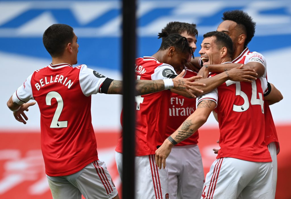 Pepe & Saka to return: Arsenal Predicted Lineup vs Wolves 2 LONDON, ENGLAND - JULY 01: Granit Xhaka of Arsenal celebrates with teammates after scoring his team's second goal during the Premier League match between Arsenal FC and Norwich City at Emirates Stadium on July 01, 2020 in London, England. Football Stadiums around Europe remain empty due to the Coronavirus Pandemic as Government social distancing laws prohibit fans inside venues resulting in all fixtures being played behind closed doors. (Photo by Shaun Botterill/Getty Images)