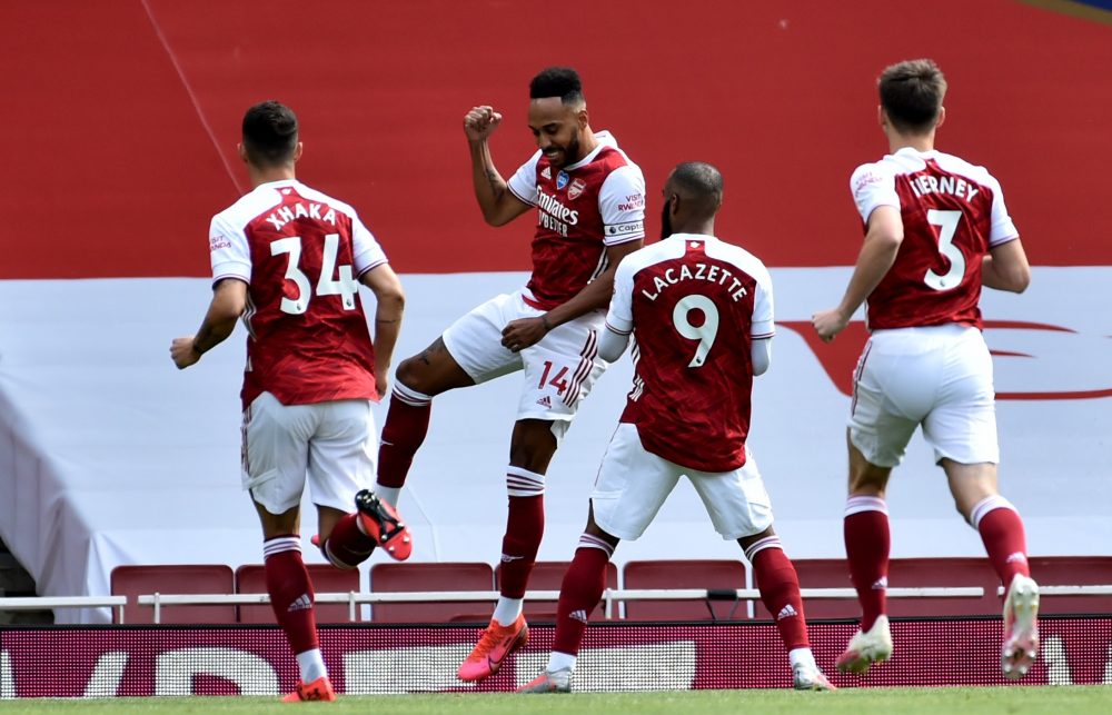 LONDON, ENGLAND - JULY 26: Pierre-Emerick Aubameyang of Arsenal celebrates scoring a penalty during the Premier League match between Arsenal FC and...