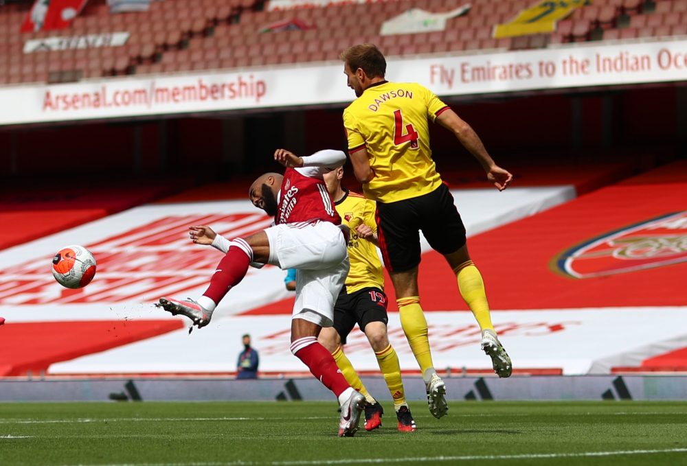 Mike Dean's Arsenal penalty face is season highlight for fans (with goals) 3 LONDON, ENGLAND - JULY 26: Alexandre Lacazette of Arsenal is fouled leading to a penalty during the Premier League match between Arsenal FC and Watford FC at Emirates Stadium on July 26, 2020 in London, England. (Photo by Julian Finney/Getty Images)