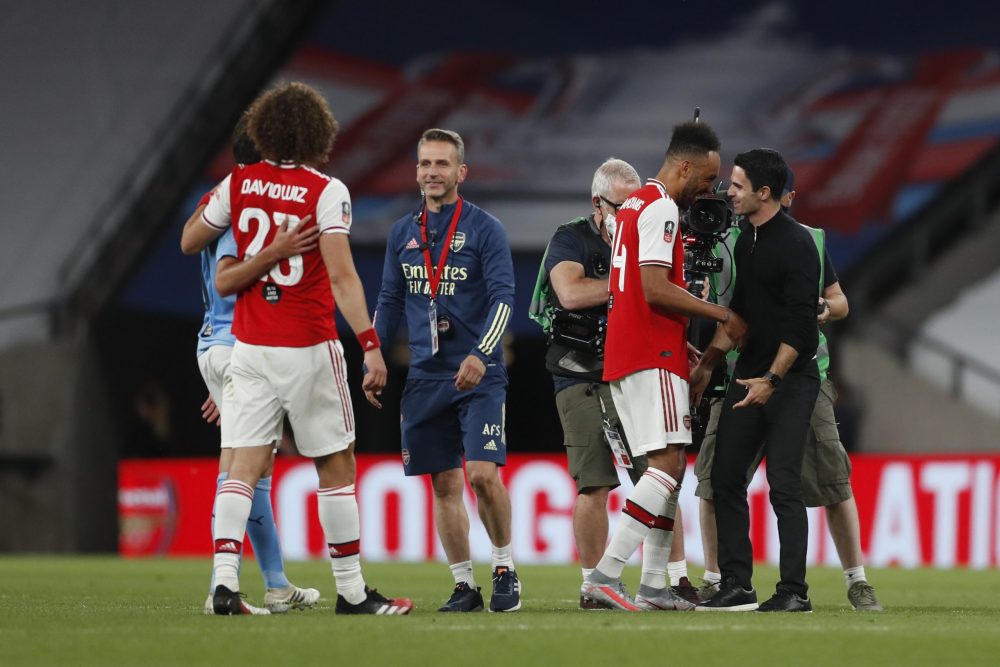Mikel Arteta admits feeling 'sorry' for fans 3 LONDON, ENGLAND - JULY 18: Pierre-Emerick Aubameyang and Mikel Arteta, Manager of Arsenal celebrate following the FA Cup Semi Final match between Arsenal and Manchester City at Wembley Stadium on July 18, 2020 in London, England. Football Stadiums around Europe remain empty due to the Coronavirus Pandemic as Government social distancing laws prohibit fans inside venues resulting in all fixtures being played behind closed doors. (Photo by Matthew Childs/Pool via Getty Images)