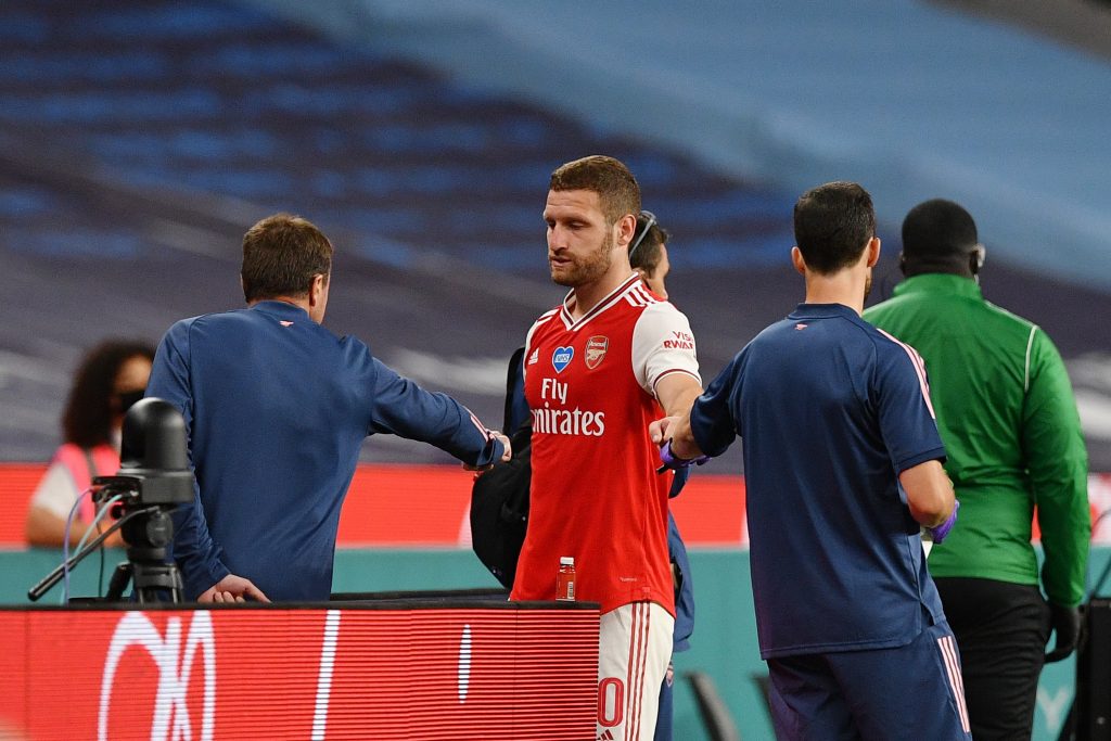 LONDON, ENGLAND - JULY 18: Shkodran Mustafi of Arsenal leaves the pitch injured during the FA Cup Semi Final match between Arsenal and Manchester City at Wembley Stadium on July 18, 2020 in London, England.(Photo by Justin Tallis/Pool via Getty Images)