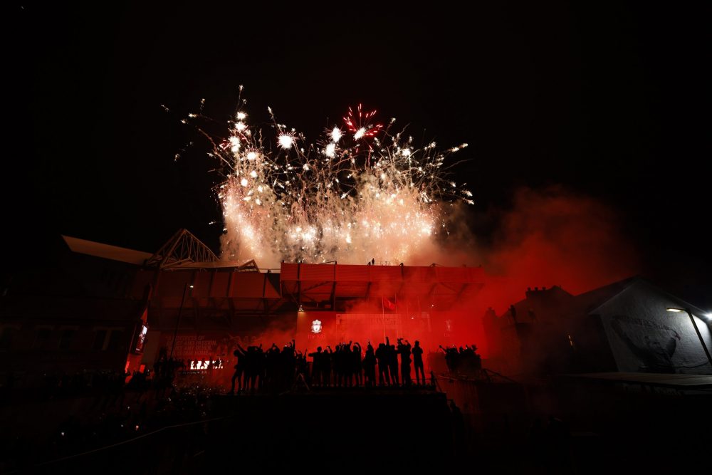 It's harder to go unbeaten now says Jose Mourinho 3 LIVERPOOL, ENGLAND - JULY 22: Liverpool fans celebrate outside Anfield stadium in front of fireworks from inside the stadium as Liverpool lift the Premier League trophy after their match against Chelsea on July 22, 2020 in Liverpool, England. Liverpool were presented with the Premier League trophy in The Kop stand at Anfield this evening, after winning the famous league with a record seven games left to play. Fans had been urged to mark the occasion at home amid coronavirus concerns, after large crowds gathered in the city to celebrate when the title was confirmed on June 25. (Photo by Christopher Furlong/Getty Images)