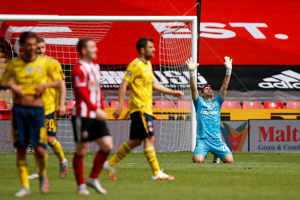 That's what he needs to prove: Arteta hands challenge to Martinez 2 Arsenal's Argentinian goalkeeper Emiliano Martinez (R) celebrates at the final whistle during the English FA Cup quarter-final football match between Sheffield United and Arsenal at Bramall Lane in Sheffield, northern England on June 28, 2020. (Photo by ANDREW BOYERS / POOL / AFP)