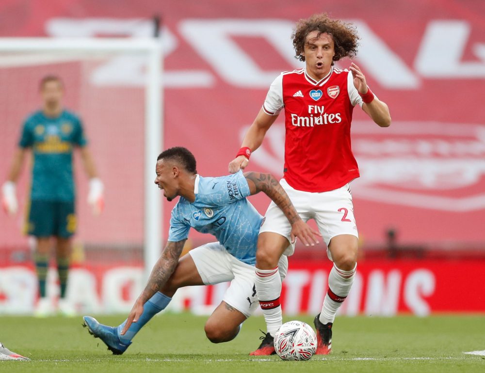 Arsenal's Brazilian defender David Luiz (R) challenges Manchester City's Brazilian striker Gabriel Jesus (L) during the English FA Cup semi-final football match between Arsenal and Manchester City at Wembley Stadium in London, on July 18, 2020. (Photo by MATTHEW CHILDS / POOL / AFP)
